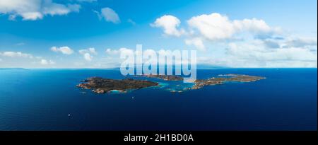 View from above, aerial shot, panoramic view of La Maddalena archipelago with Budelli, Razzoli and Santa Maia islands bathed by a turquoise water. Stock Photo