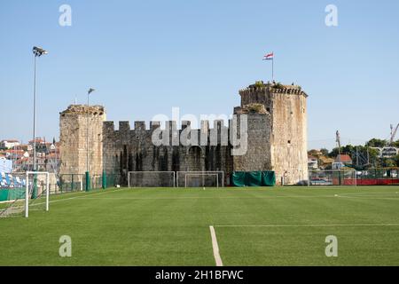 football pitch behind medieval Kamerlengo castle in Trogir, Croatia Stock Photo