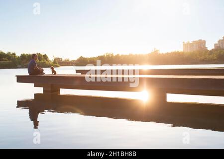 Happy mature man relaxing in park Stock Photo
