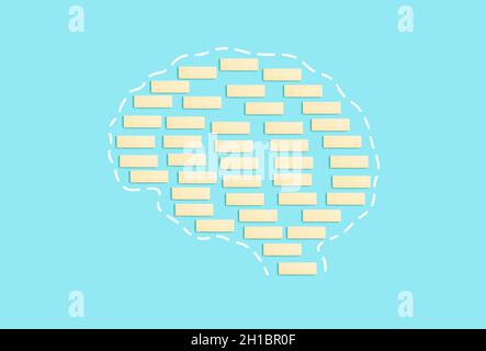 Brain from blocks on a pure blue background. Consciousness, thinking, dementia, alzheimer, brain health concept. High quality photo Stock Photo