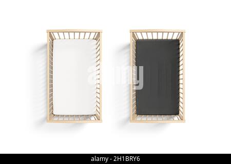 Blank wood cot with black and white crib sheet mockup Stock Photo
