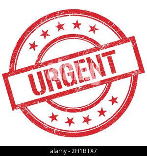 URGENT text written on red round vintage rubber stamp. Stock Photo