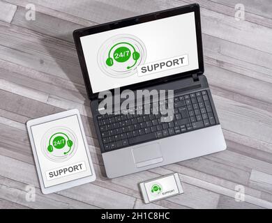 Support concept shown on different information technology devices Stock Photo
