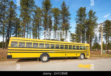 School bus parked at the side of a country road, South Dakota, USA. Stock Photo