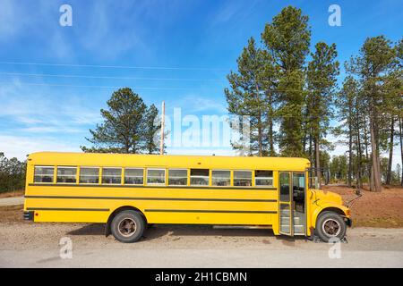 School bus parked at the side of a country road, South Dakota, USA. Stock Photo