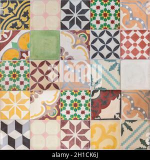 Collection of ancient Portuguese stone tiles with different individual designs Stock Photo