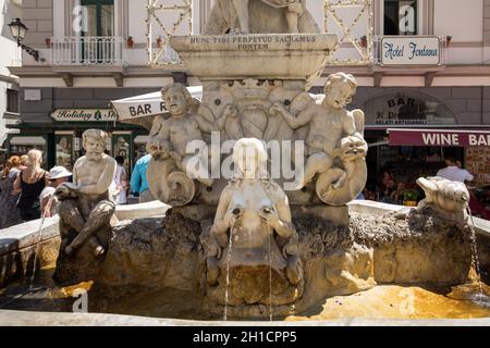 Amalfi, Italy, June 13, 2017: Fountain of Saint Andrew with naughty Nymph in Amalfi . Campania .Italy Stock Photo