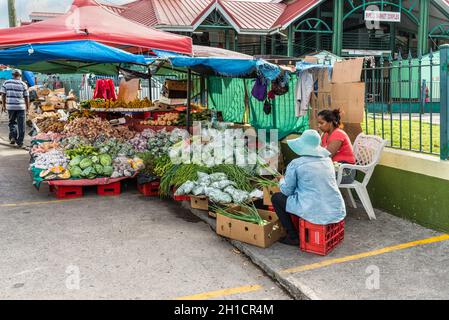 St John's, Antigua and Barbuda - December 18, 2018: Vendors fresh fruit and vegetable on a local market in St. John's, Antigua, West Indies, Caribbean Stock Photo