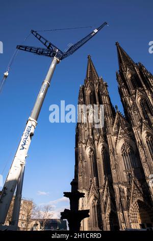 after the removing of a 30-meter-high scaffold, that hung for 10 years in 105 meters hight at the north tower of the cathedral, the 124 meter high cra Stock Photo