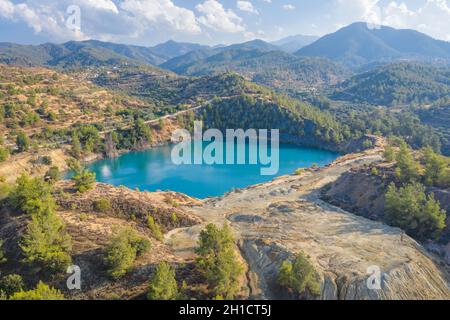 Memi mine lake, abandoned copper mine in Cyprus with the environment partially recovered and reforested Stock Photo