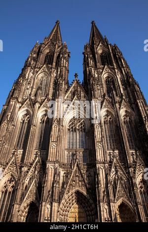 after the removing of a 30 meter high scaffolding, which was hanging at a height of 105 meters on the north tower of the cathedral, the west facade is Stock Photo