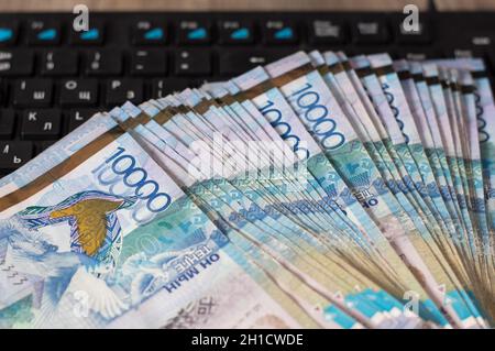 Paper banknotes tenge KZT. Tenge is the national currency of Kazakhstan. bank of Kazakhstan Stock Photo