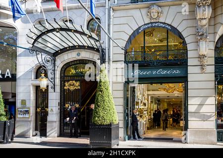Paris/France - September 10, 2019 : The Guerlain store and Marriott luxury hotel entrance on Champs-Elysees avenue Stock Photo