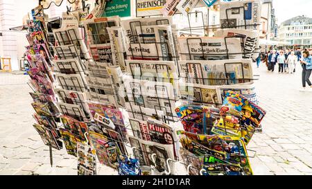 TRIER, GERMANY- SEPTEMBER 13 2019: German and international magazines and newspapers for sale at a german newsstand in TRIER, Germany. Stock Photo