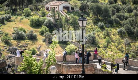Toledo, Spain - April 28, 2018: tourists admiring the valley and taking photos near the historic district on a spring day Stock Photo