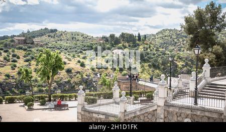 Toledo, Spain - April 28, 2018: tourists admiring the valley and taking photos near the historic district on a spring day Stock Photo