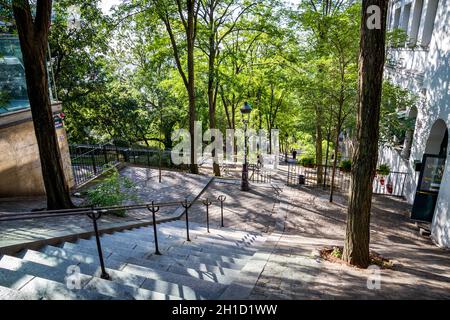 PARIS/FRANCE - September 6, 2019 : Typical Parisian stairway street on Butte Montmartre Stock Photo