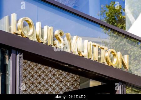 Paris/France - September 10, 2019 : The Louis Vuitton luxury store entrance sign on Champs-Elysees avenue Stock Photo