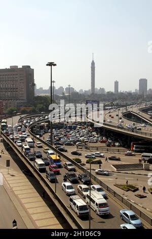 CAIRO, EGYPT - MARCH 03: Square in Cairo on MARCH 03, 2010. Square with flyover and tower in background, Cairo, Egypt. Stock Photo