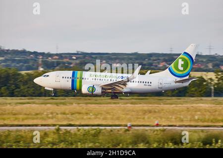 BUDAPEST, HUNGARY - CIRCA 2015: Airliner of Transavia landing at Budapest Liszt Ferenc Airport, Boeing 737-700 aircraft. Transavia is Dutch low-cost a Stock Photo