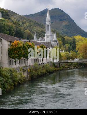Lourdes, France - 9 Oct 2021: The Sanctuaires Notre-Dame de Lourdes Cathedral, a Stock Photo