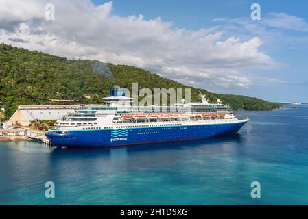 Ocho Rios, Jamaica - April 22, 2019: Cruise Ship Pullmantur Monarch docked in the tropical Caribbean island of Ocho Rios, Jamaica. Stock Photo