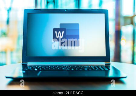 POZNAN, POL - MAR 24, 2020: Laptop computer displaying logo of Microsoft Word, a word processor developed by Microsoft Stock Photo