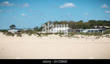 Tavira Island, Portugal - May 3, 2018: Tourist restaurant terrace on the island of Tavira in the beach town center on a spring day Stock Photo