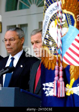 United States President George W. Bush announces his intention to withdraw the US from the 1972 ABM Treaty with the Russian Federation in the Rose Garden of the White House in Washington, DC on December 13, 2001. He called it a 'Cold War relic'. Standing at left is US secretary of State Colin L. Powell. Credit: Ron Sachs/CNP Stock Photo