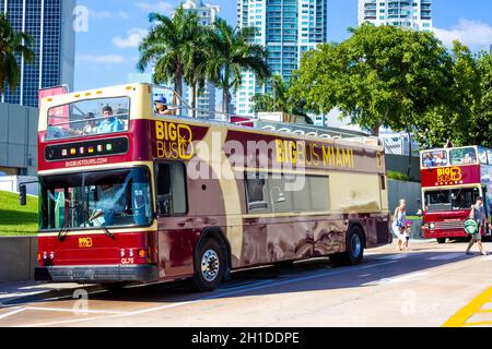 Miami, USA - November 30, 2019: Double decker Big Bus Miami Hop-on Hop-off bus tours are a popular way to see the city. This one is cruising Ocean Dri Stock Photo