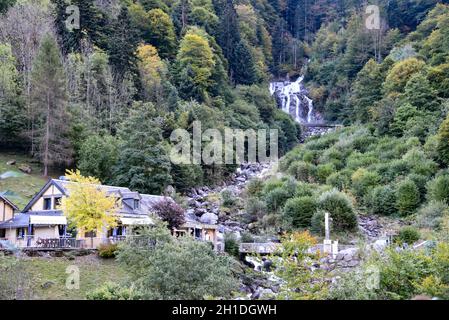 Cauterets, France - 10 Oct 2021: Waterfalls cascade from the Pyrenees mountains near La Raillere springs Stock Photo