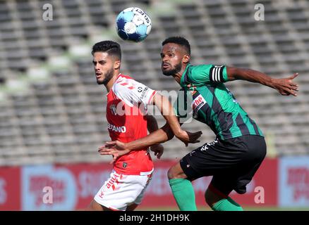 LAVRADIO, PORTUGAL - OCTOBER 16: Yan Couto of SC Braga competes for the ball with Patrick of UFC Moitense ,during the Portuguese Cup match between UFC Moitense and SC Braga at Estadio Alfredo Da Silva on October 17, 2021 in Lavradio, Portugal. (MB Media) Stock Photo