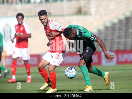 LAVRADIO, PORTUGAL - OCTOBER 16: Yan Couto of SC Braga competes for the ball with Patrick of UFC Moitense ,during the Portuguese Cup match between UFC Moitense and SC Braga at Estadio Alfredo Da Silva on October 17, 2021 in Lavradio, Portugal. (MB Media) Stock Photo