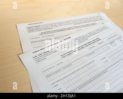 BERLIN, GERMANY - CIRCA MARCH 2020: Fluggast Aussteigekarte (translation:  Passenger Locator Form) Stock Photo