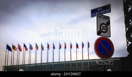 strasbourg, France - december 28, 2017 - set of european flags in front of the european parliament on a winter day at dusk Stock Photo