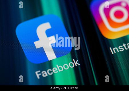 Burgos, Spain - April 13, 2020: Macro photography of social media app icons of Facebook and instagram on mobile screen . Stock Photo