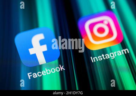 Burgos, Spain - April 13, 2020: Macro photography of social media app icons of Facebook and instagram on mobile screen . Stock Photo