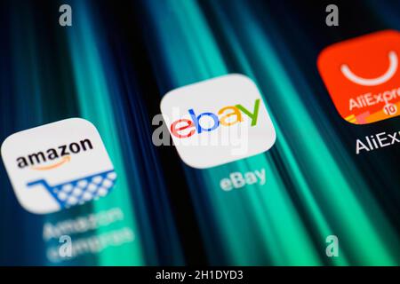 Burgos, Spain - April 13, 2020: Global e-commerce applications icons on smartphone screen close-up. Mobile application icon of Amazon, Ebay, Aliexpres Stock Photo