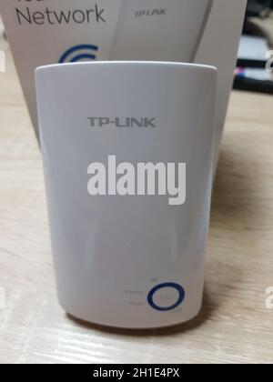 HEILIGENHAUS, NRW, GERMANY - DECEMBER 16, 2018:  Heiligenhaus, Nrw, Germany - December 16, 2018:  TP-Link TL-WA850RE WLAN Repeater with 300 Mbps, WLAN Stock Photo