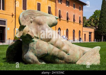 PISA, ITALY - APRIL, 2018:   Fallen Angel sculpture by Igor Mitoraj at the Miracles Square in Pisa Stock Photo