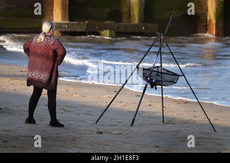 Beach fishing at high tide at Hornsea, Yorkshire. East coast. UK. Stock Photo