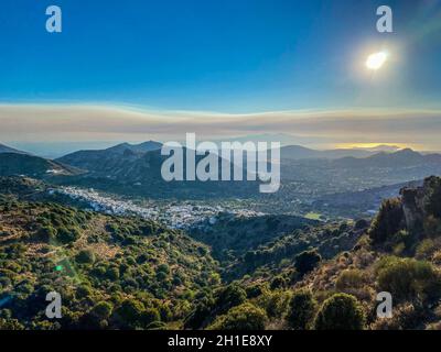 Athene fire smoke on the skyline in the sky of Filoti greek island village, Naxos island, Greece. August, 2021 Stock Photo