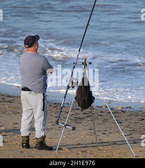 Beach fishing at high tide at Hornsea, Yorkshire. East coast. UK. Stock Photo