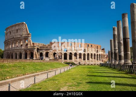 ROME, ITALY - APRIL, 2018: The famous Colosseum in Rome seen from the Temple of Venus and Roma located on the Velian Hill Stock Photo