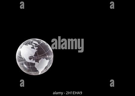 America on a transparent world ball on a black background Stock Photo