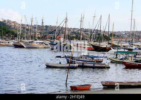 salvador, bahia / brazil - january 5, 2017: boats are seen anchored at the pier in the Ribeira neighborhood in the city of Salvador. *** Local Caption Stock Photo