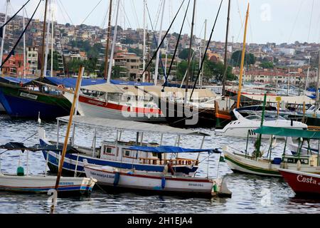 salvador, bahia / brazil - january 5, 2017: boats are seen anchored at the pier in the Ribeira neighborhood in the city of Salvador. *** Local Caption Stock Photo