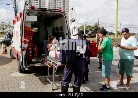 salvador, bahia / brazil - november 11, 2014: samu's rescuer is seen during care for accident victims in the city of Salvador. *** Local Caption *** Stock Photo