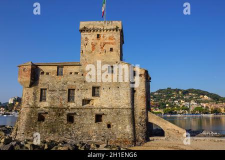 italian castles on sea italian flag - castle of Rapallo , Liguria Genoa Tigullio gulf near Portofino at Italy . Stock Photo