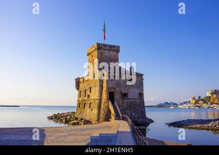 italian castles on sea italian flag - castle of Rapallo , Liguria Genoa Tigullio gulf near Portofino at Italy . Stock Photo